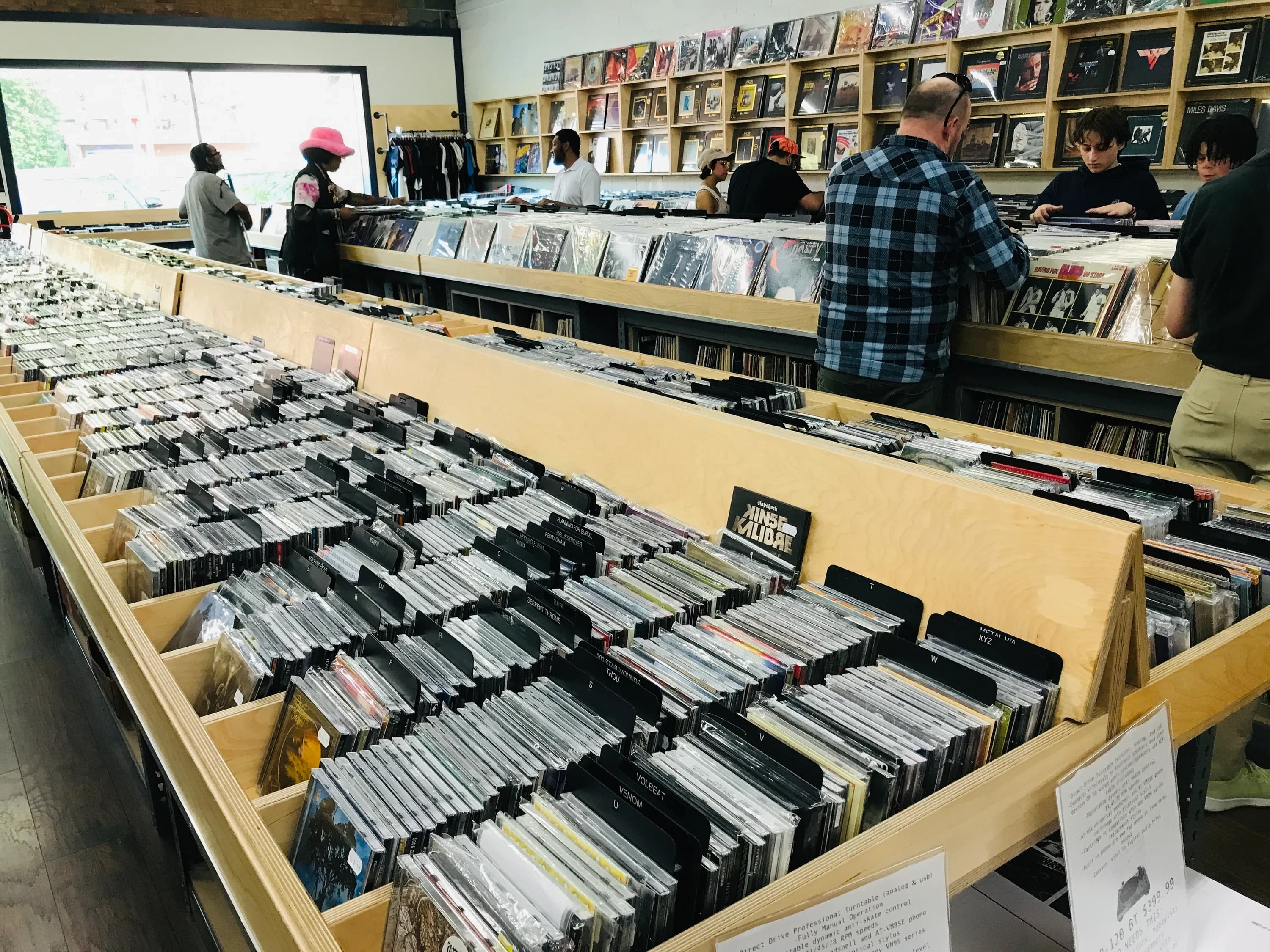 Wide view of CD and record bins inside CD Cellar